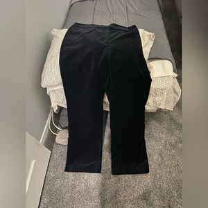 Valerie Steven’s black valor pants. Smooth banded with zipper. No pockets sz 14